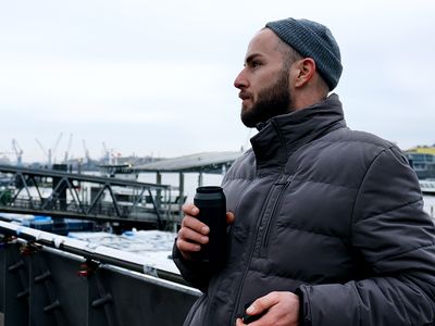 Siemens Social Hub-Latte Artist Yuri Ma drinks coffee at the harbor in Hamburg