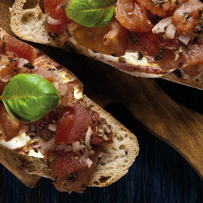 Pan-fried Halloumi on a bed of tomatoes and bruschetta