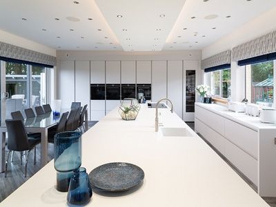 Modern kitchen design with all white furniture