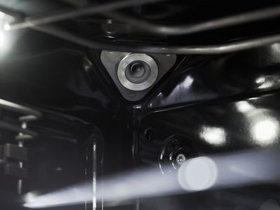 Abbildung einer Kamera im Backofen Inneren. Die Kamera erkennt den Bräunungsgrad deiner Speisen