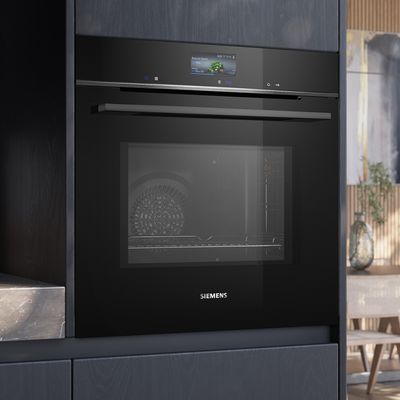 Close up of black Siemens oven in kitchen unit