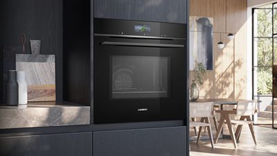 Close up of black Siemens oven in kitchen unit