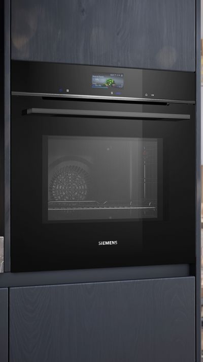 Close up of black Siemens oven in kitchen unit