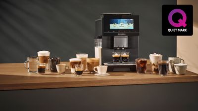 Different coffee drinks surrounding machine