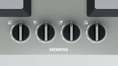 un pannello di controllo Siemens con quattro manopole rotanti per le impostazioni degli apparecchi.