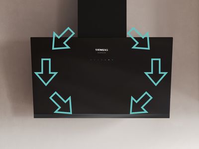 Schuine studioLine-wandschouwkap van Siemens met recirculatiepijlen