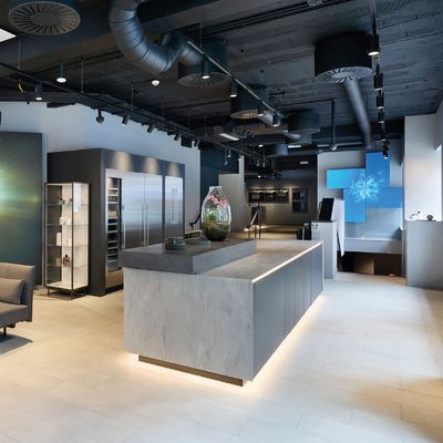 Modern office interior featuring a sleek reception area, contemporary furniture, and digital displays. Bright, spacious, and stylish design.