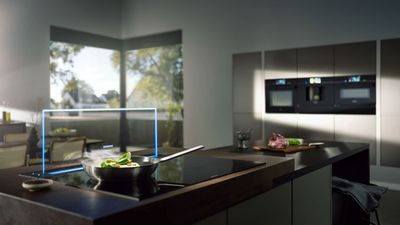 Light and open kitchen living area with numerous Siemens appliances