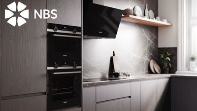 Kitchen with multiple Siemens appliances and NBS logo overlay