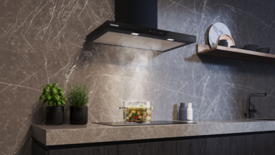 Siemens Matt Edition Dunstabzugshaube in Schwarz matt &uuml;ber Induktionskochfeld, montiert an graubrauner Steinwand mit dampfendem Topf und modernen K&uuml;chenelementen.