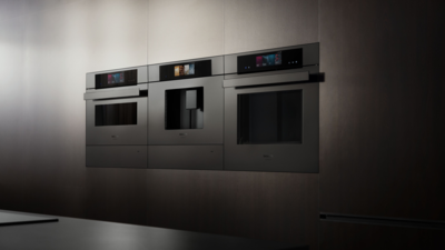 Moderne K&uuml;che in Mattschwarz mit Siemens Matt Edition Einbauger&auml;ten.