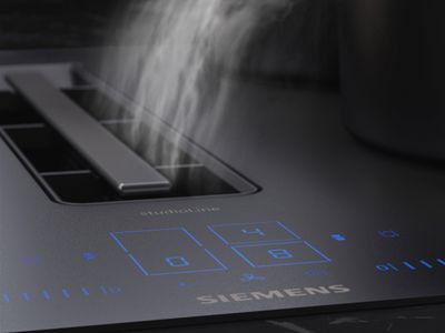 Close up of hob extracting steam