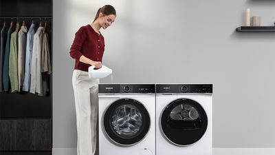 High efficiency washing machine with i-Dos