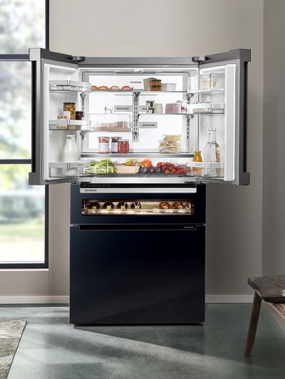Siemens multi door cooling appliance with doors open showing inside 