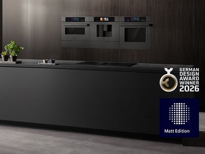 Moderne K&uuml;che mit matten Fronten und matten integrierten Siemens Einbauger&auml;ten.