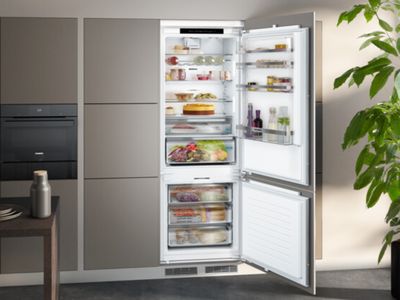 Open built in cooling appliances in minimal kitchen
