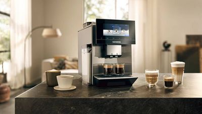 Freestanding coffee machine on kitchen counter