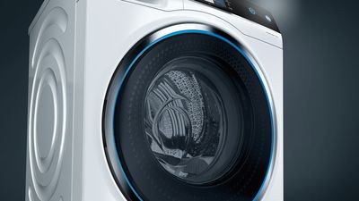 пральна машина Siemens, синє флуоресцентне кільце навколо дверцят