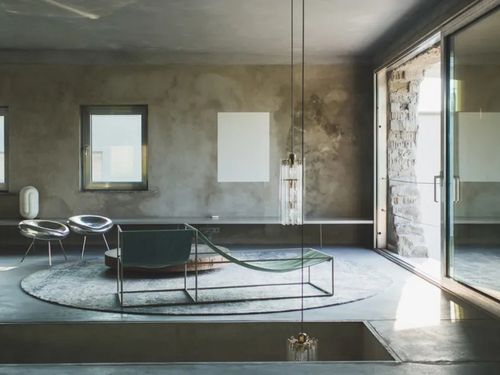  Loft de dise&ntilde;o con paredes y suelos de hormig&oacute;n 