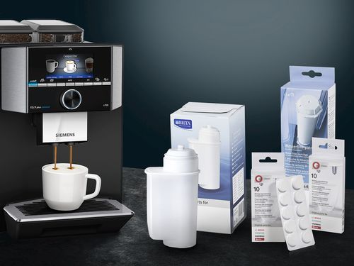 Coffee cleaning kits and filters next to Siemens coffee machine