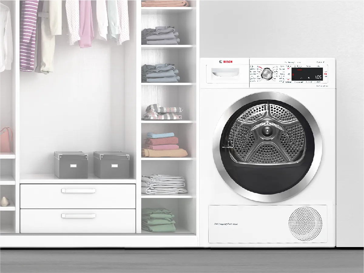 Bosch washing machine next to closet