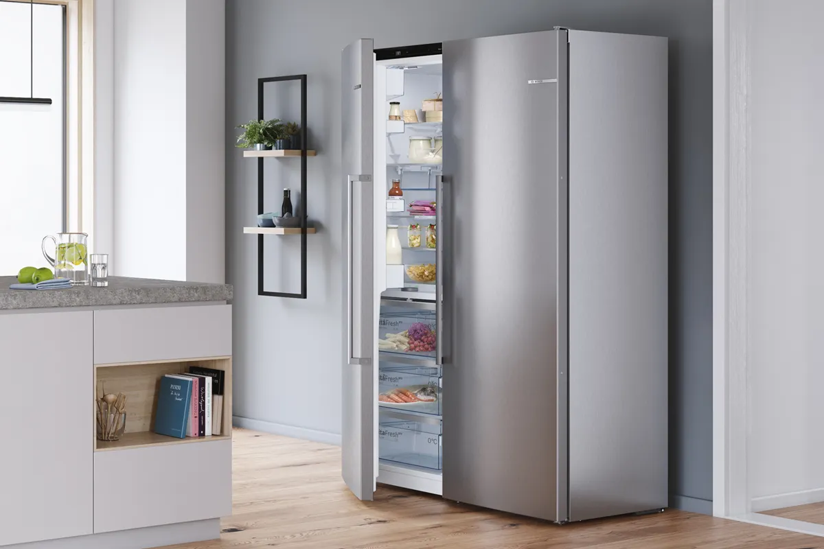 Built-in Bosch fridge-freezer with two open drawers highlights VitaFresh and NoFrost.