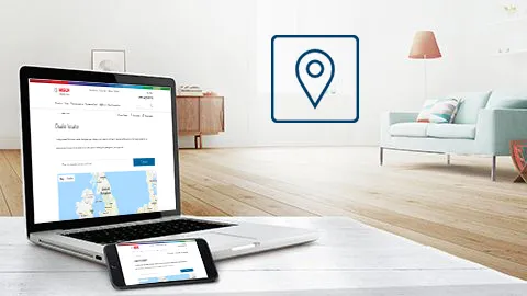 A tablet displaying the Bosch contact page on a wooden counter in a white kitchen.