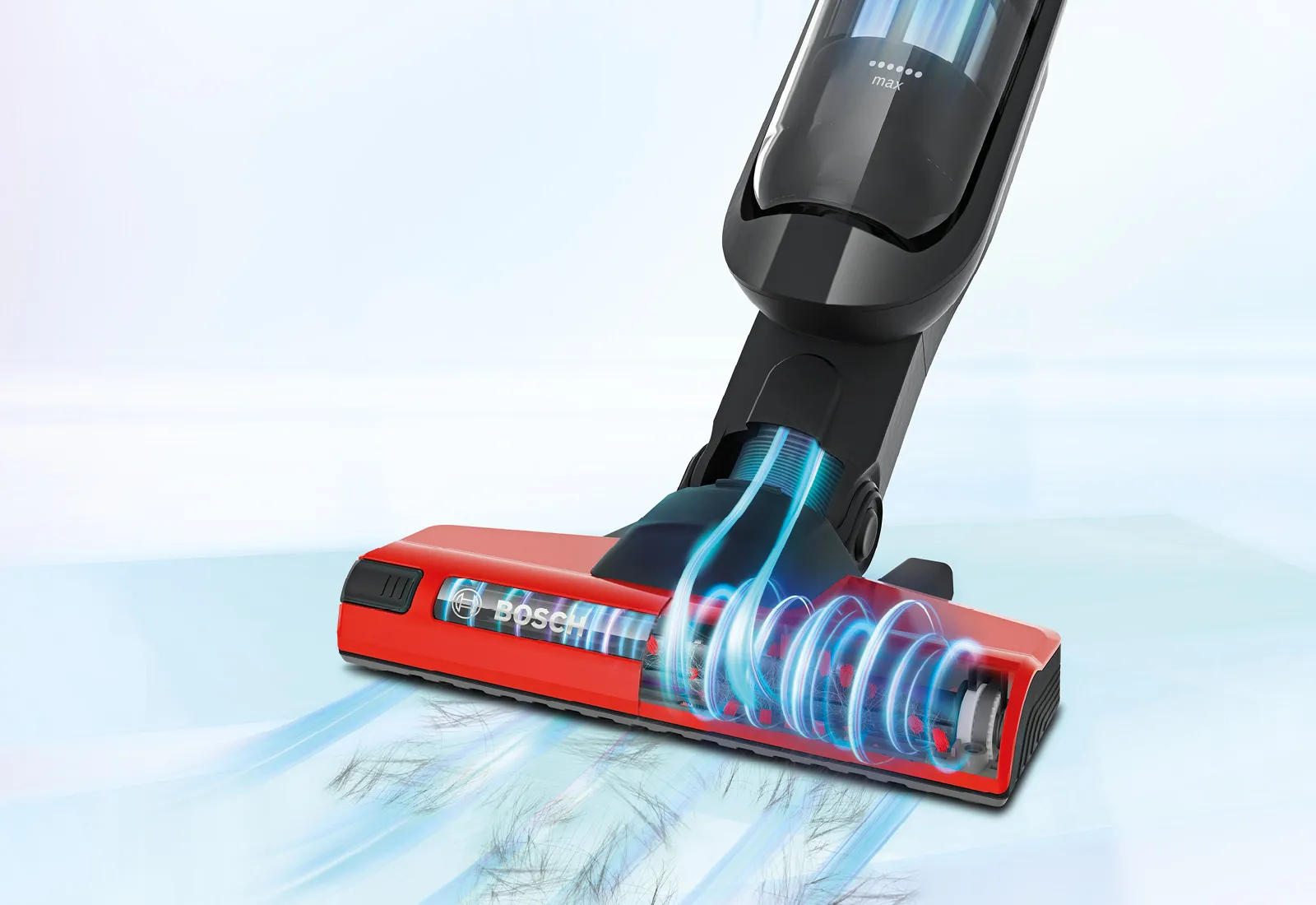 Aspirator cu design roșu și albastru, care prezintă flux de aer și putere de aspirare.