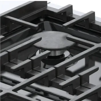 Close-up of a Bosch black gas stovetop burner with sturdy cast iron grates.