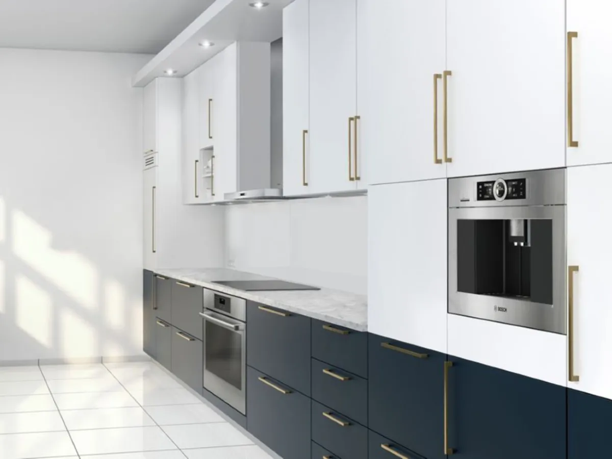 Modern kitchen with white cabinets, dark drawers, Bosch stainless steel appliances, and tile flooring.