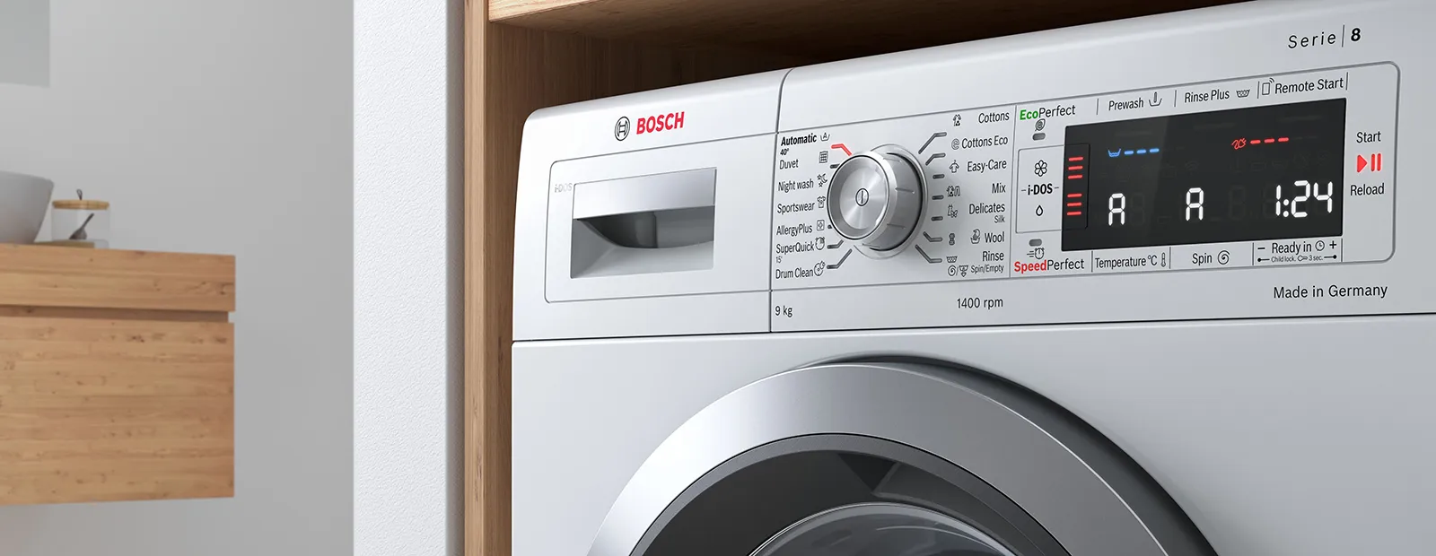 Close up of of appliance showing washing machine symbols
