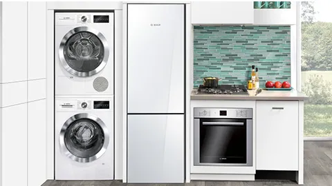 Bosch Kitchen appliances including refrigerator, oven, and stacked washer and dryer.