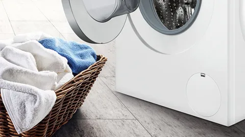 Washing machine, laundry basket, towels, clean, household appliance, domestic chore.