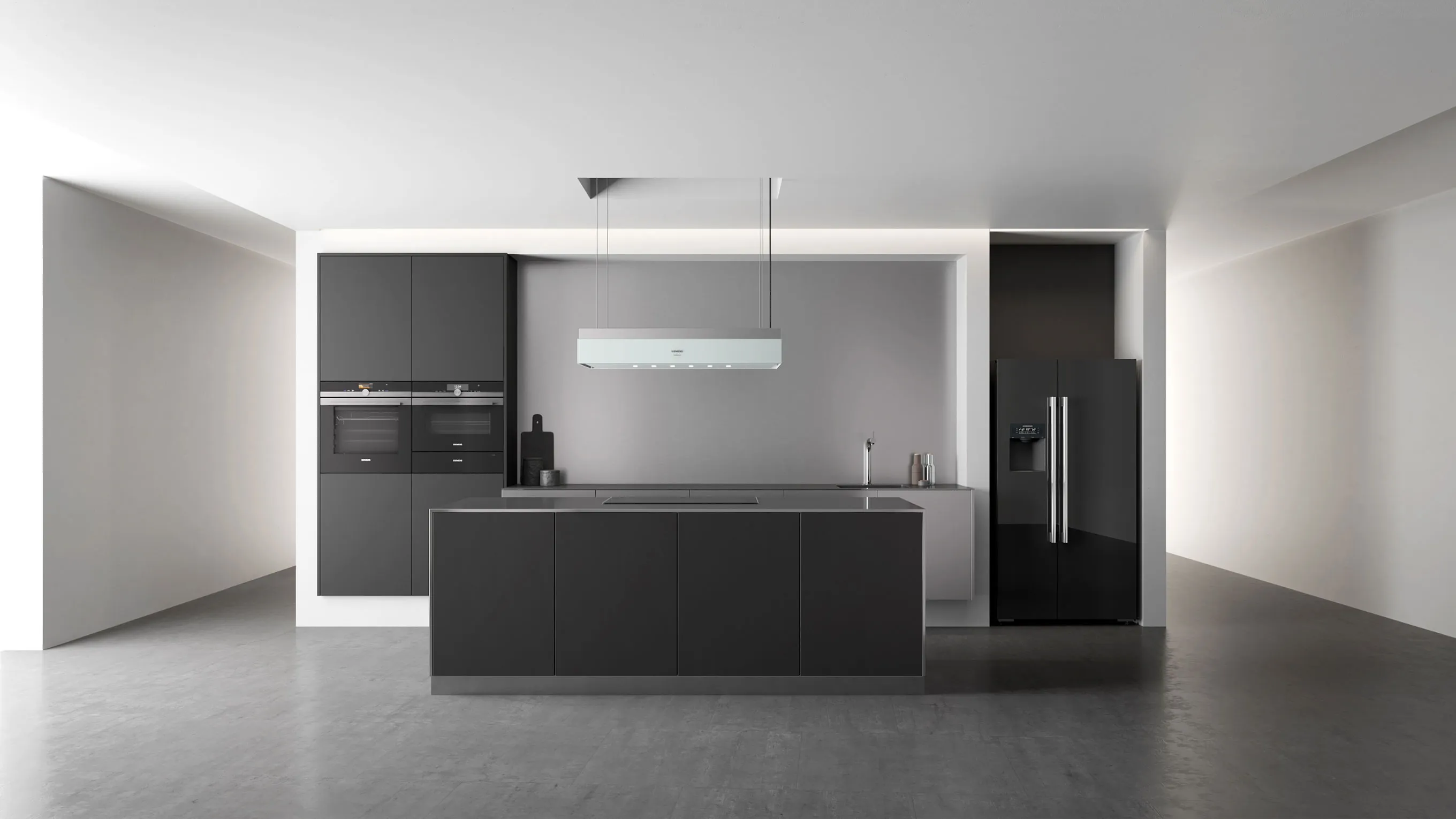 Modern minimalist kitchen with sleek black cabinets, island, and appliances in a bright, open space.