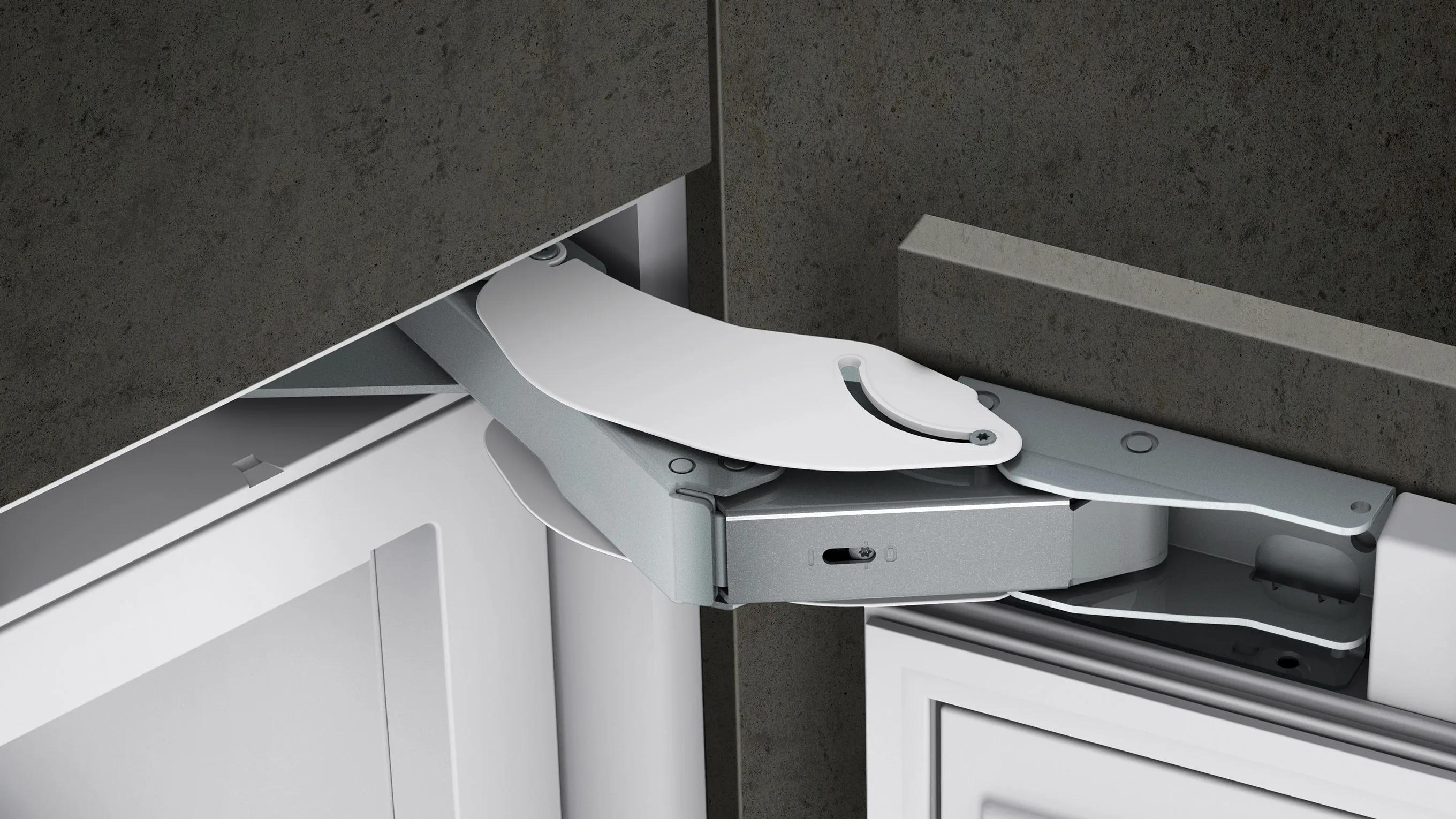 Closeup of a modern kitchen cabinet hinge mechanism with adjustable metal components.