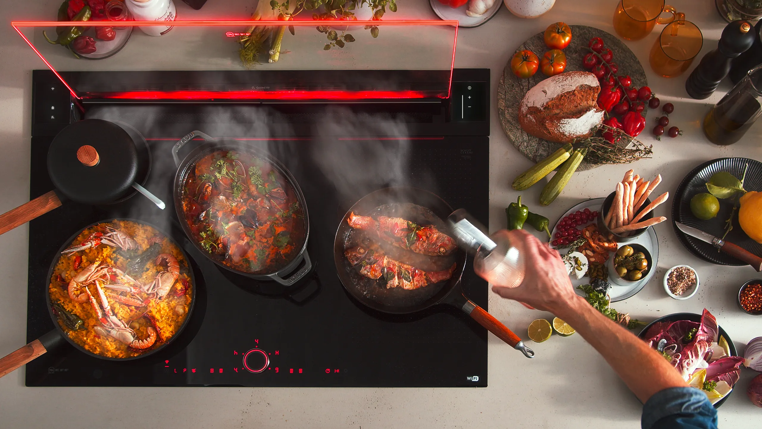 NEFF worktop extractor fan being used while cooking delicious food