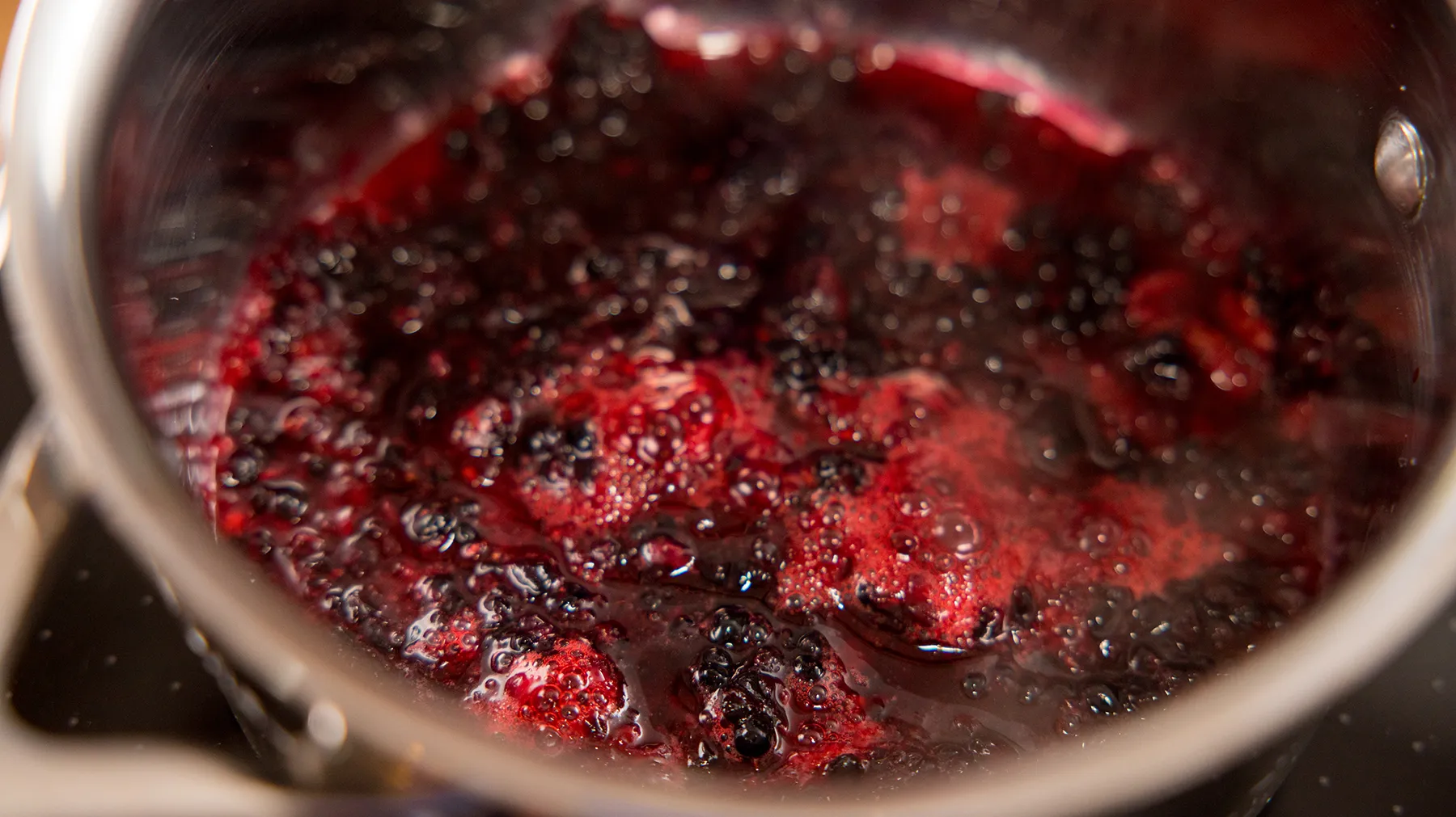 Berry compote in pan