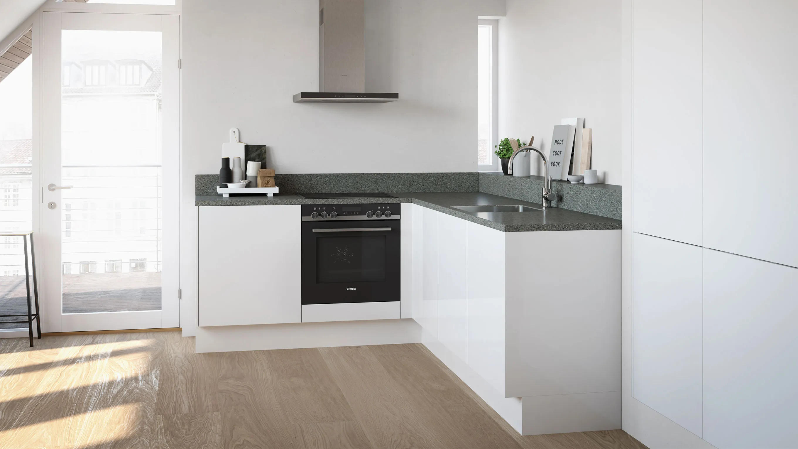 Modern, minimalist kitchen with white cabinets, dark countertops, and hardwood floors.