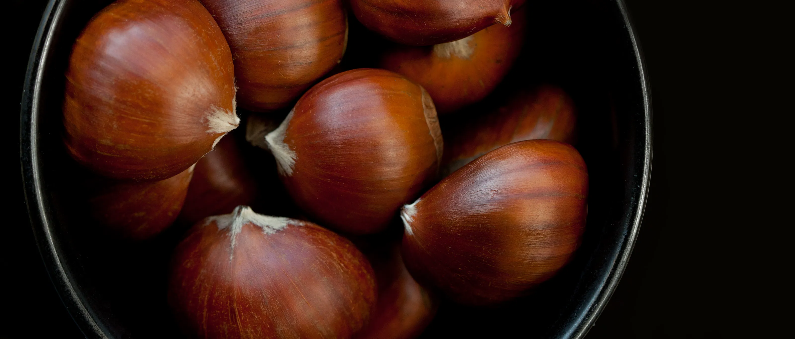 Chestnuts in black bowl