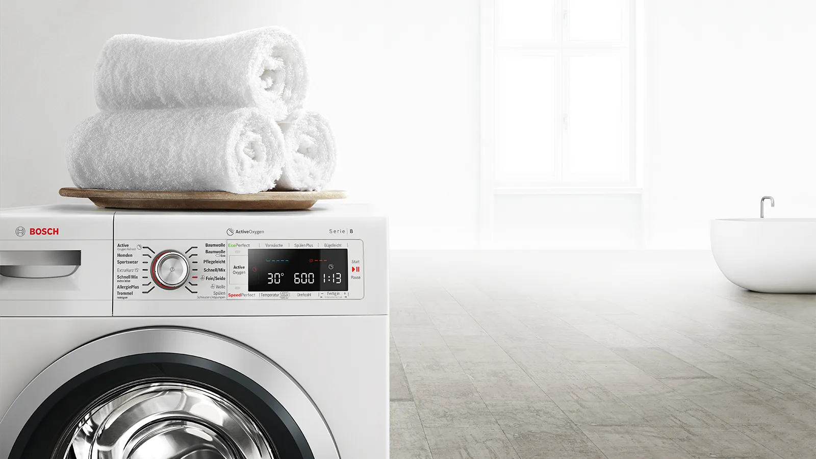 Bosch washing machine with towels on top