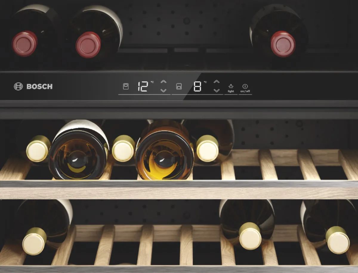 Digital control panel of a wine cabinet with two temperature zones: red wine on the top, white wine on the lower shelves.