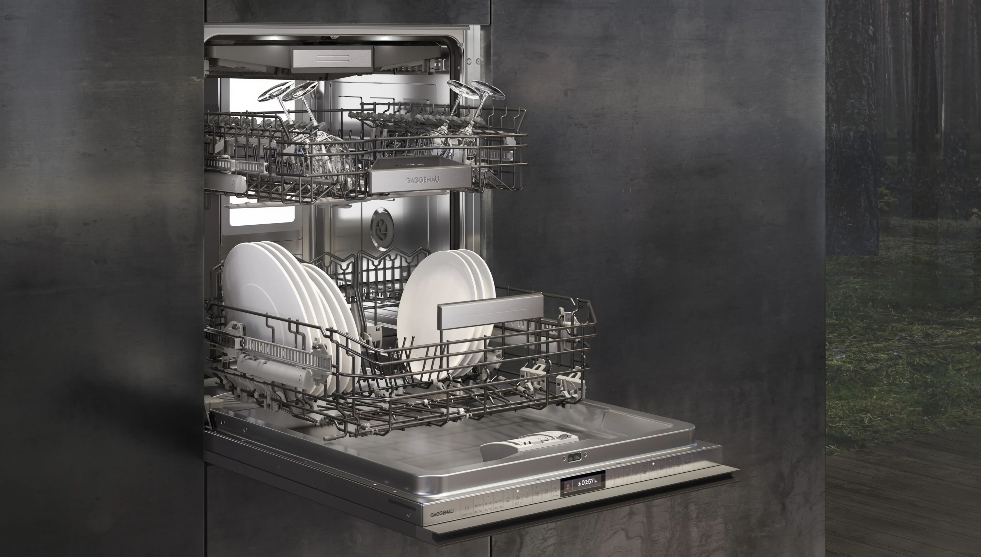 An open Gaggenau 400 series dishwasher integrated into a wall in a modern kitchen