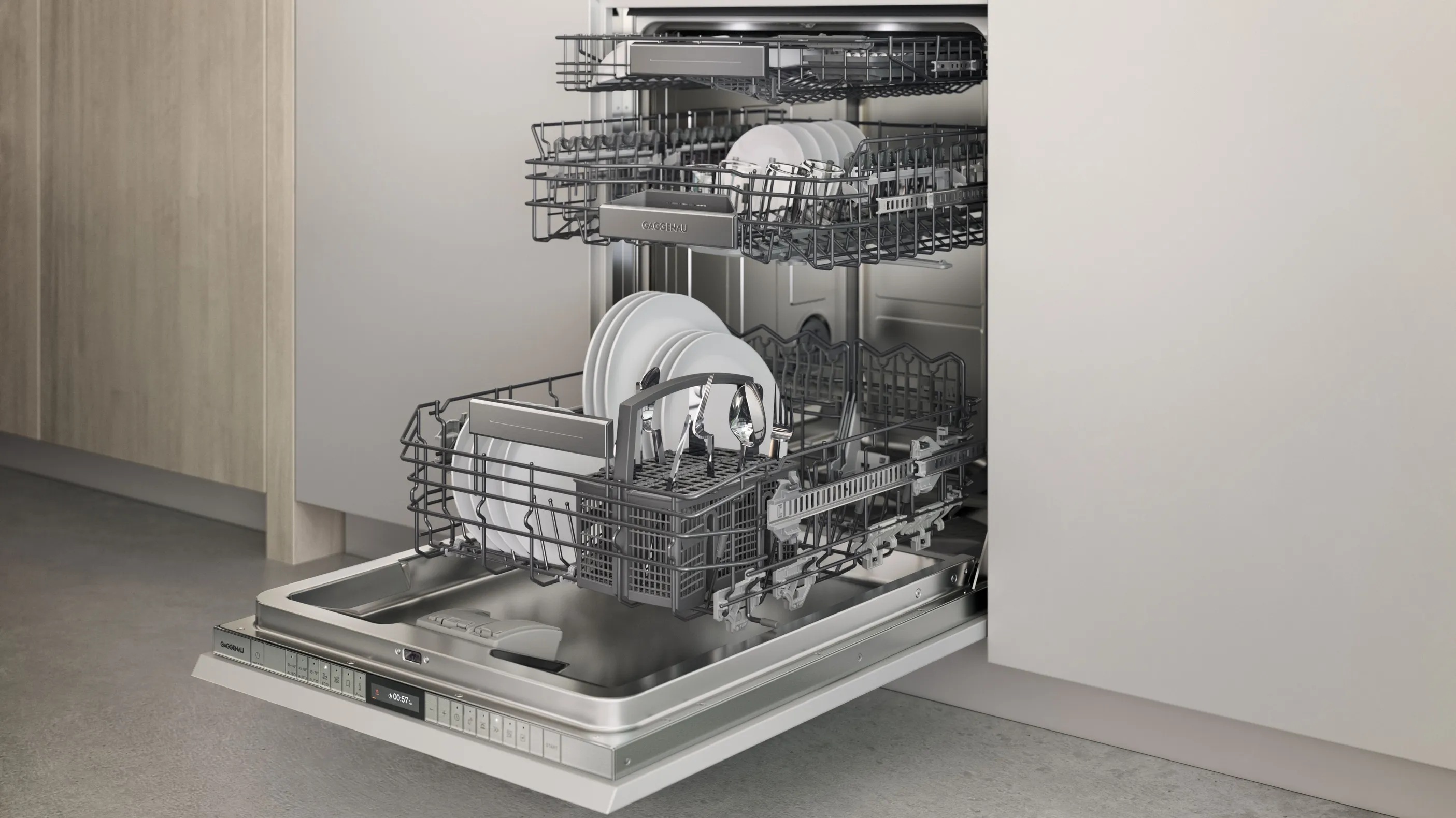 An open Gaggenau 200 series dishwasher in a bright modern kitchen