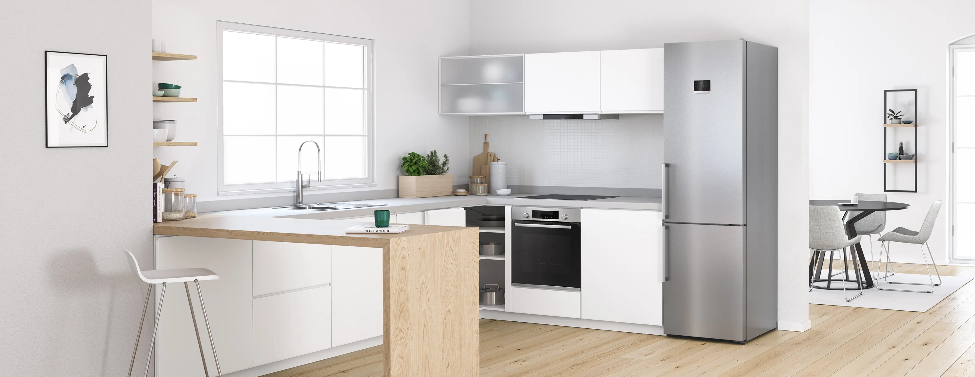 Modern kitchen with white and wood cabinets, open refrigerator filled with food, large window, and wooden floor.