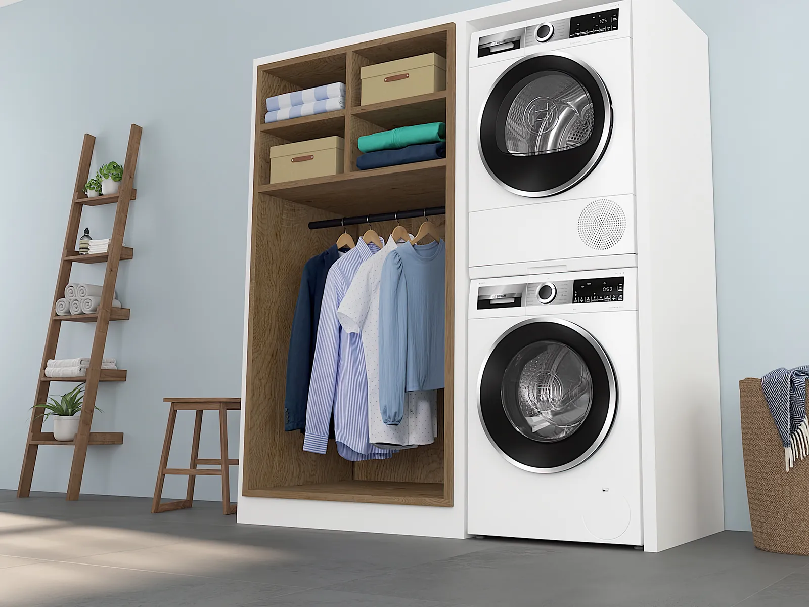 Pralnia z pralką, suszarką, półkami i powieszonymi ubraniami.