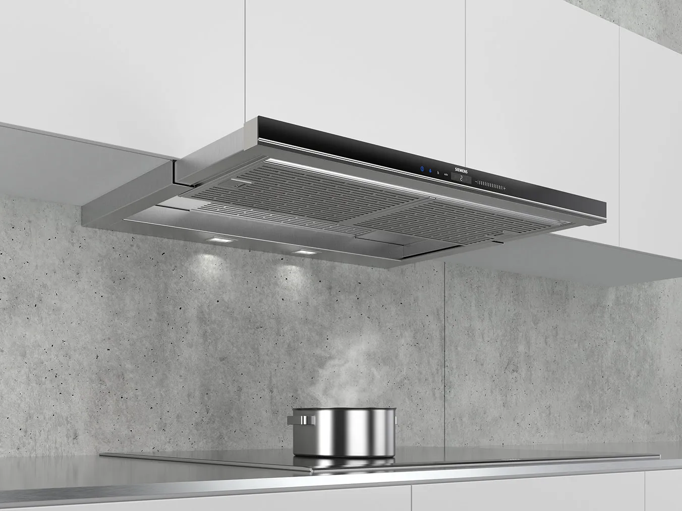 Rostfritt stål kök avgasfläkt och spis i modern minimalistiskt kök.