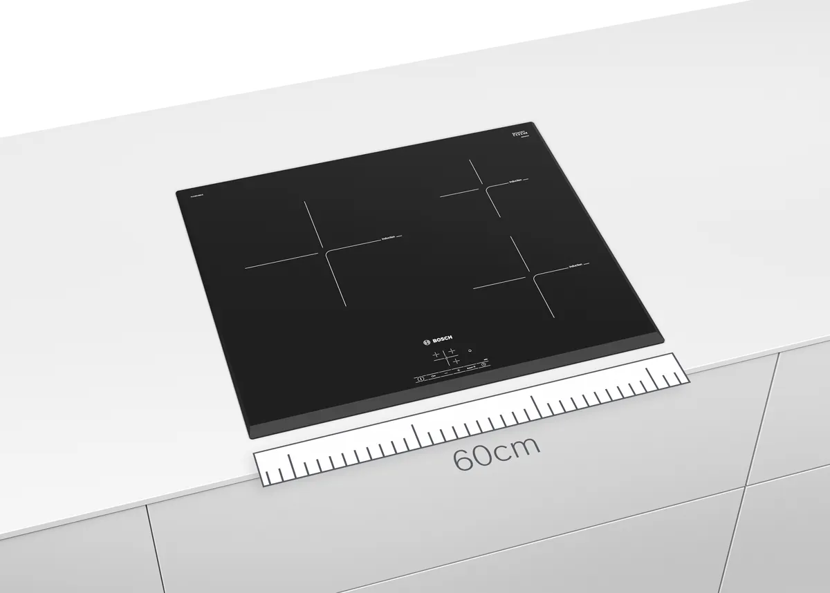 Induction cooktop with black glass surface and control panel.
