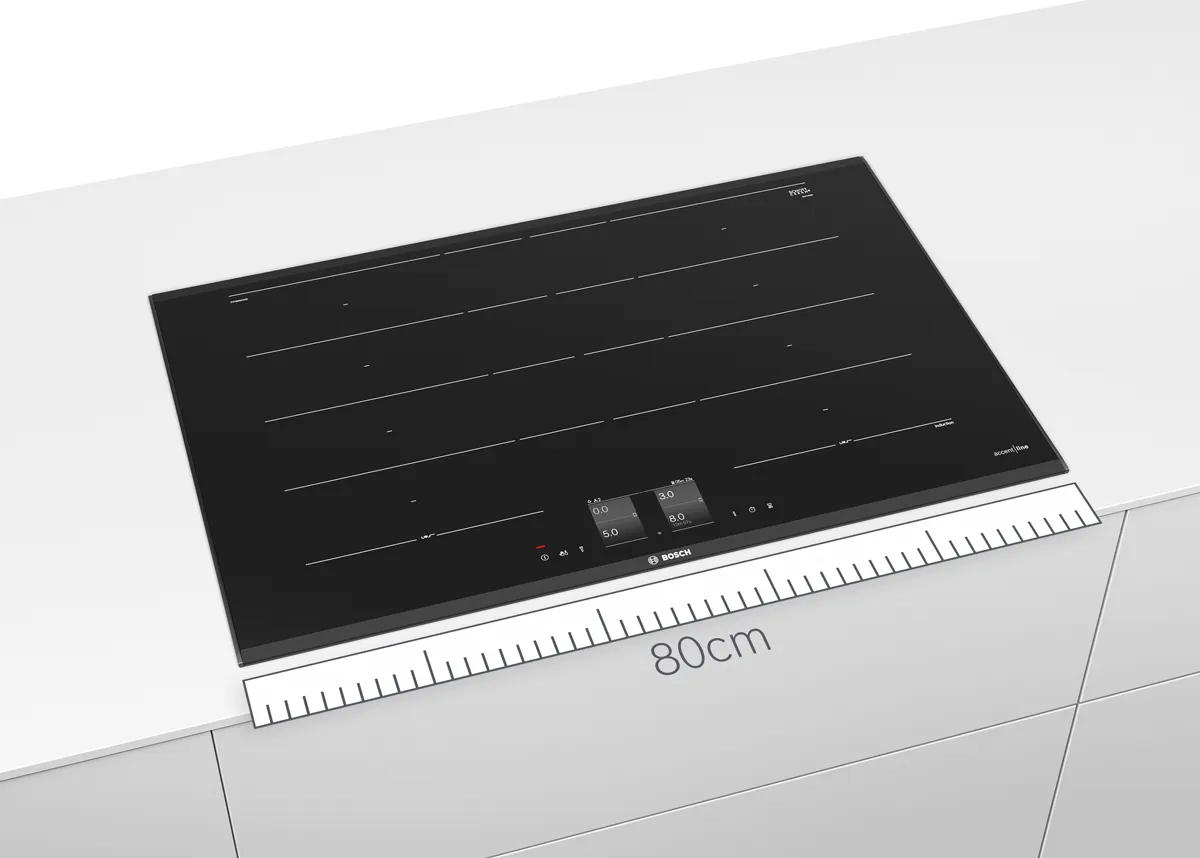 Black rectangular device with buttons and display on white surface.