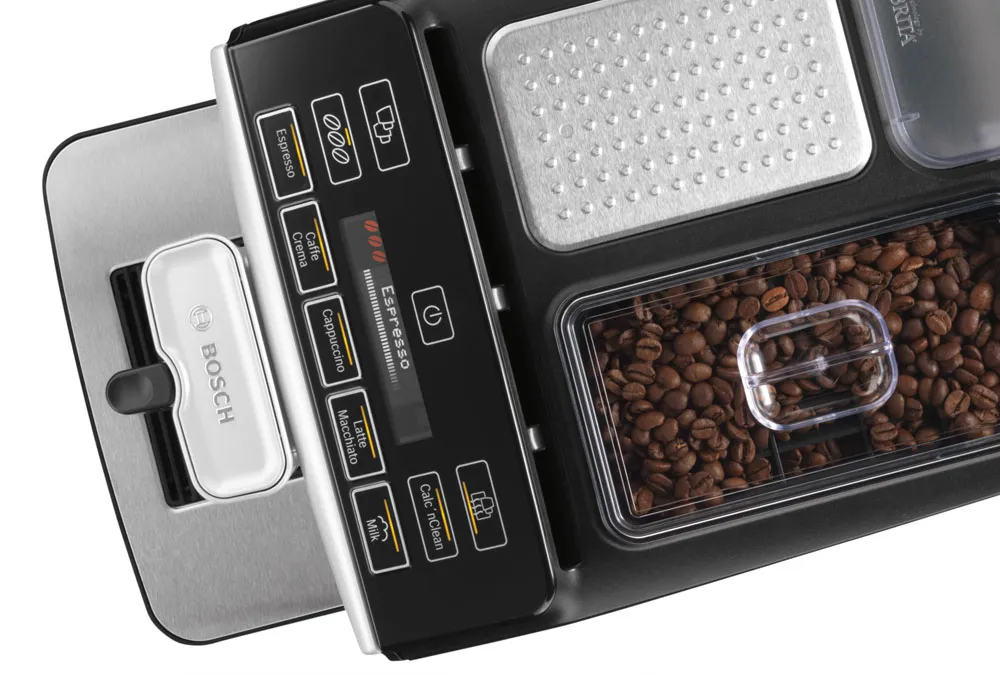 Top-down view of a Bosch coffee machine, showing the control panel with coffee options, a compartment of coffee beans, and a Brita water filter.