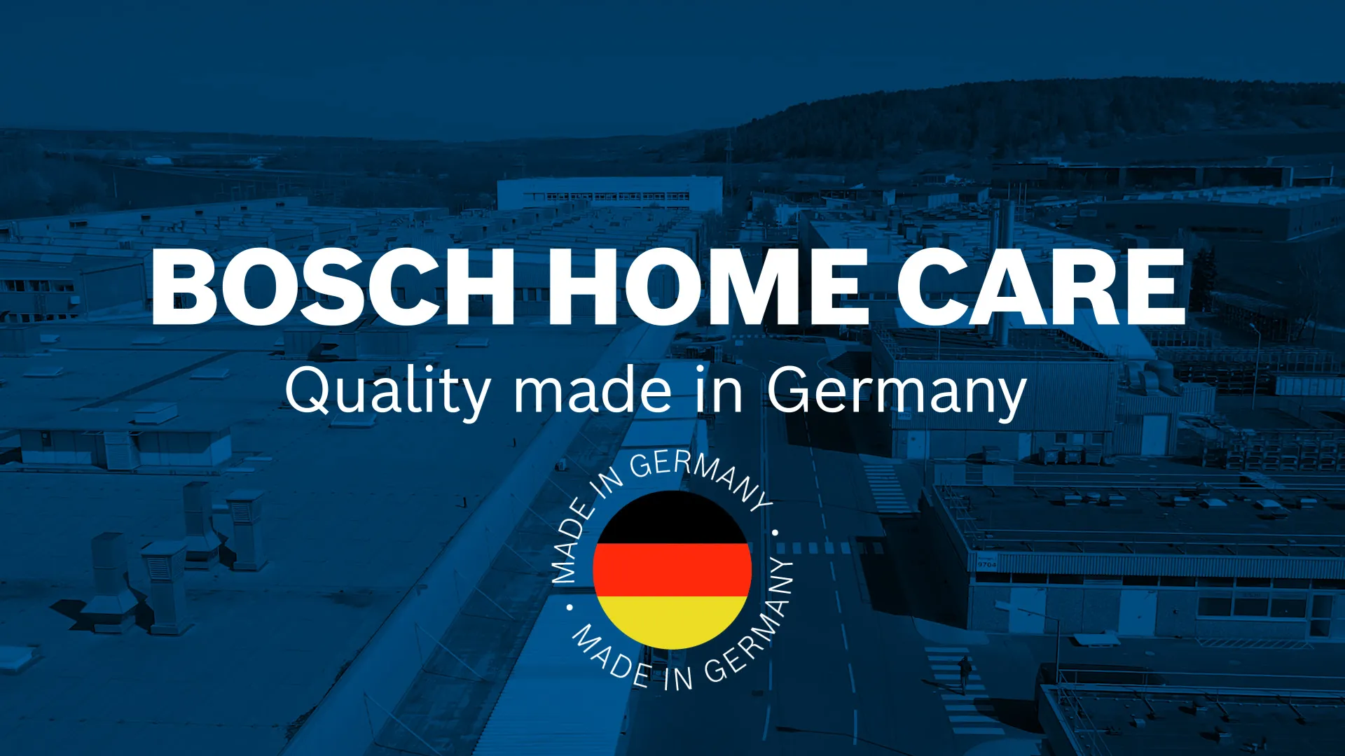 Bosch Home Logo-ul de îngrijire pe un peisaj industrial de zăpadă, subliniind "Calitatea făcută în Germania.".